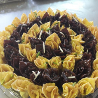 تولیدیه باقلوا گل اناروهفت مغز به صورت عمده در نجف اباد