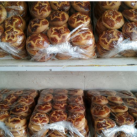 تولید و عرضه کماج و کلوچه به صورت فله در بسته