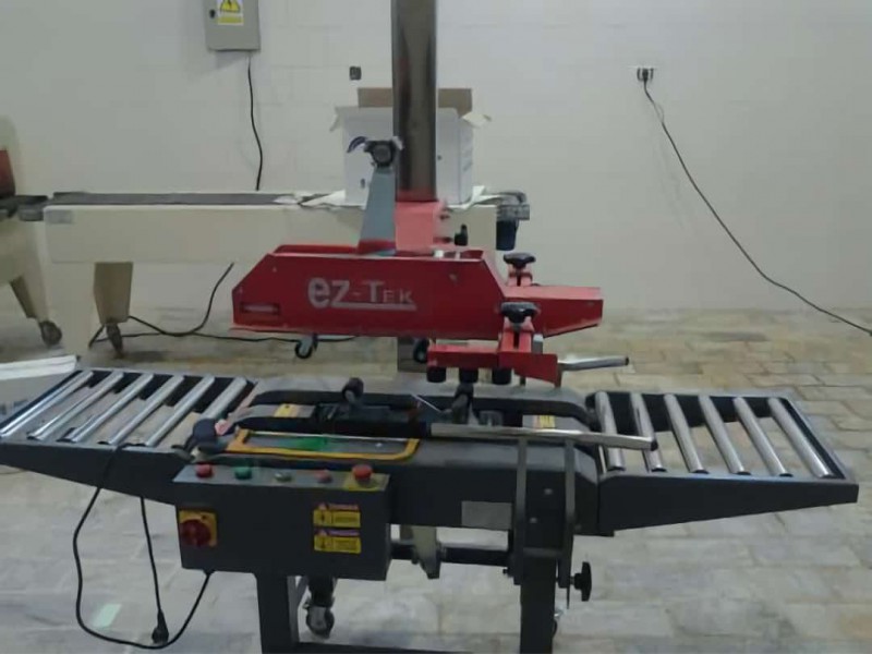 دستگاه کارتن چسب زن0