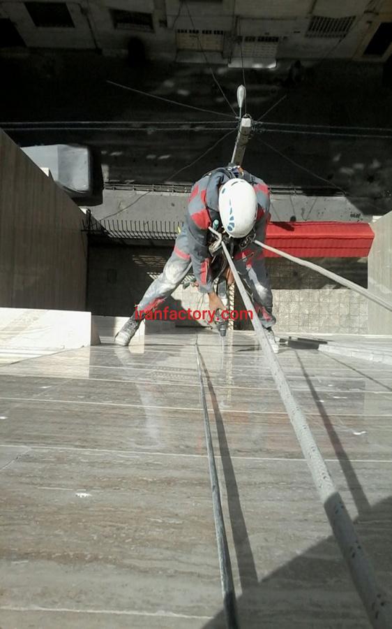 پیچ و رولپلاک سنگ نمای ساختمان0