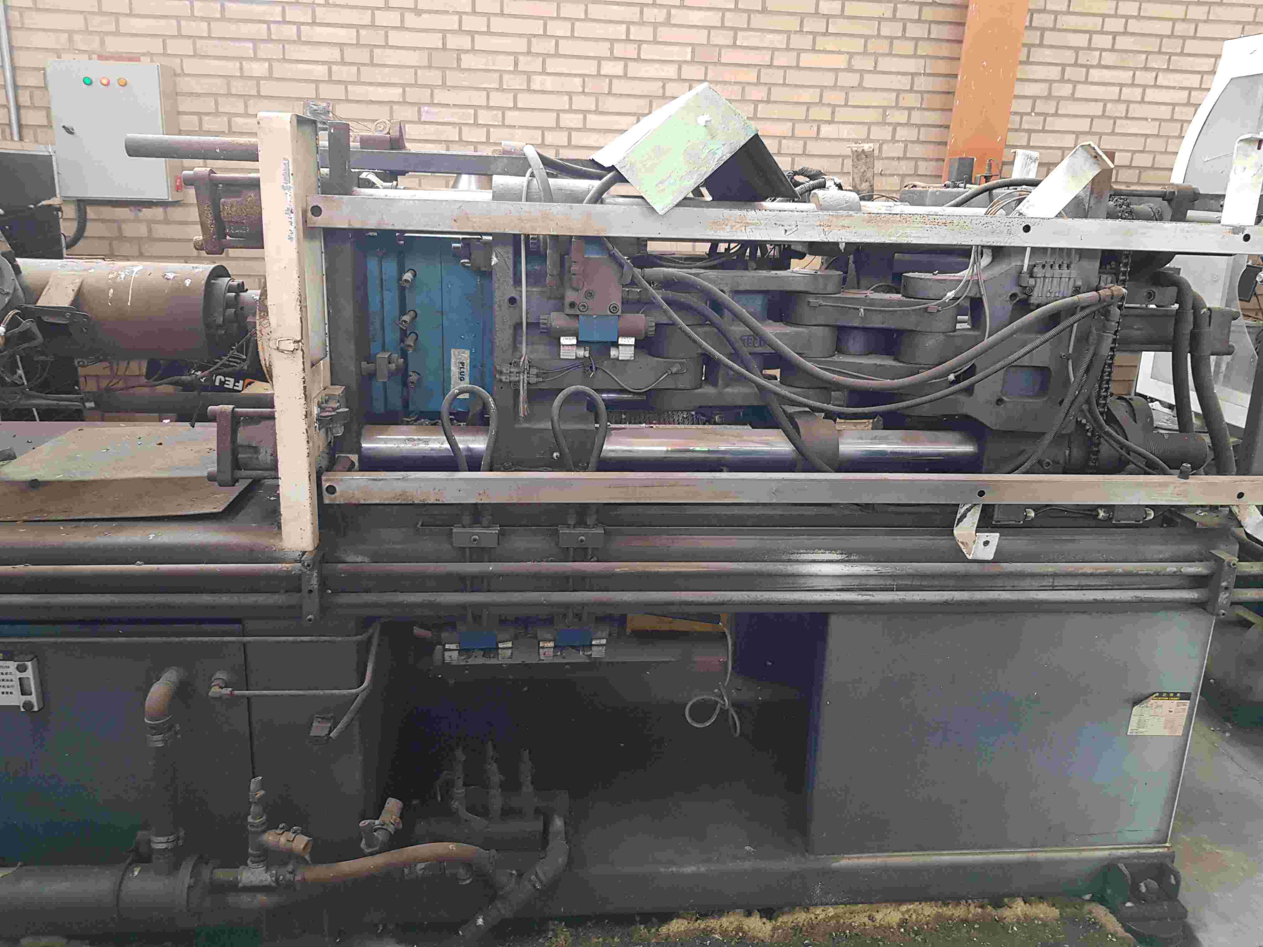 تزریق پلاستیک 128 تن چنده