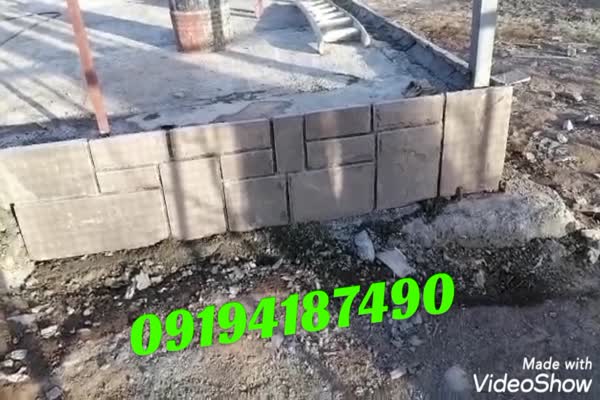 اجرای سنگ نمای دیوار باغچه با سنگ ورقه ای0